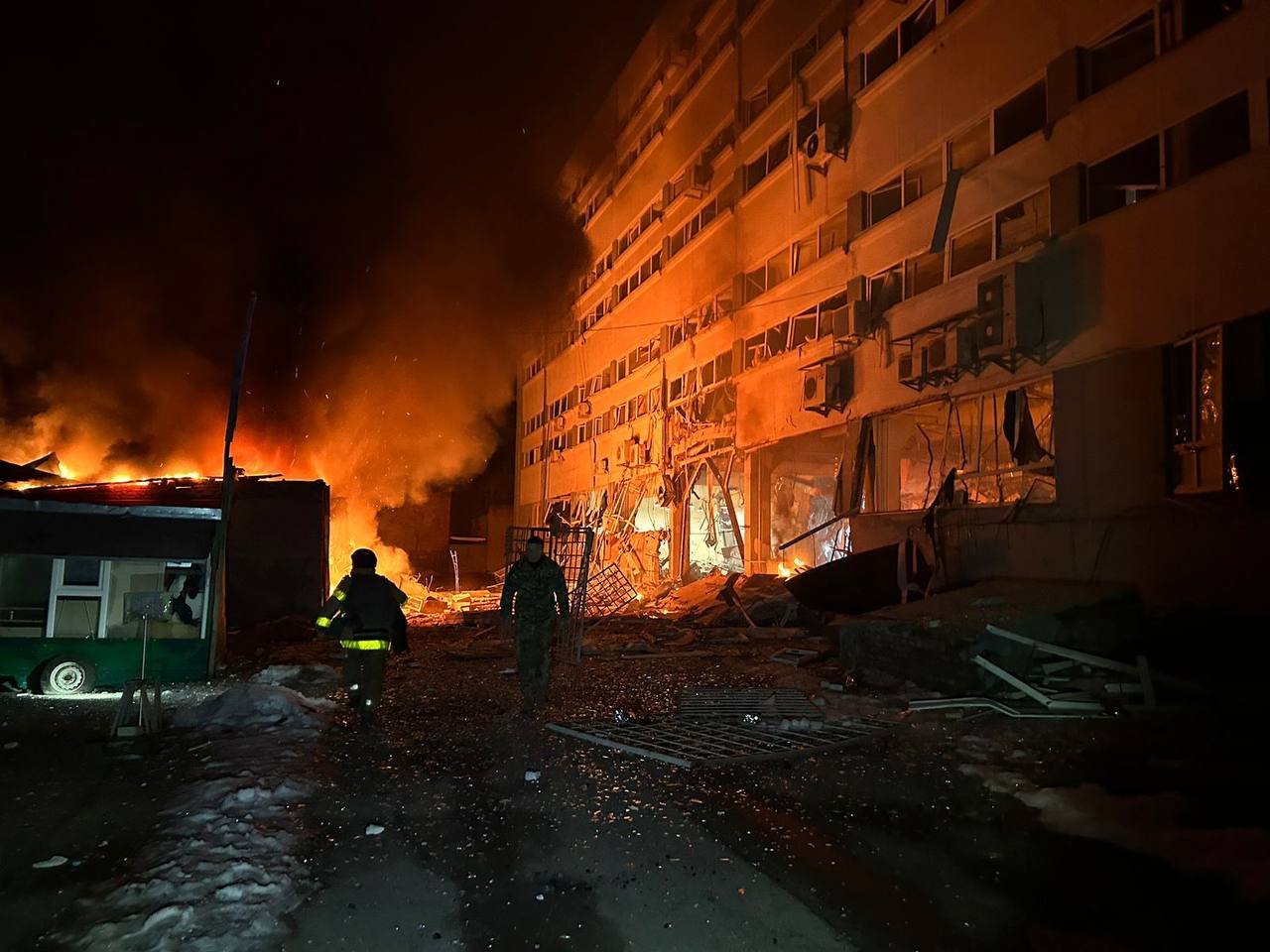 A firemen walking on a building

Description automatically generated with medium confidence