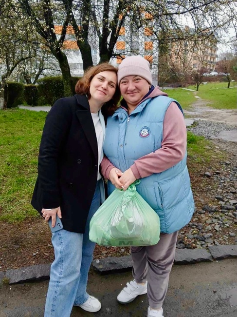 Two women standing together outside

AI-generated content may be incorrect.