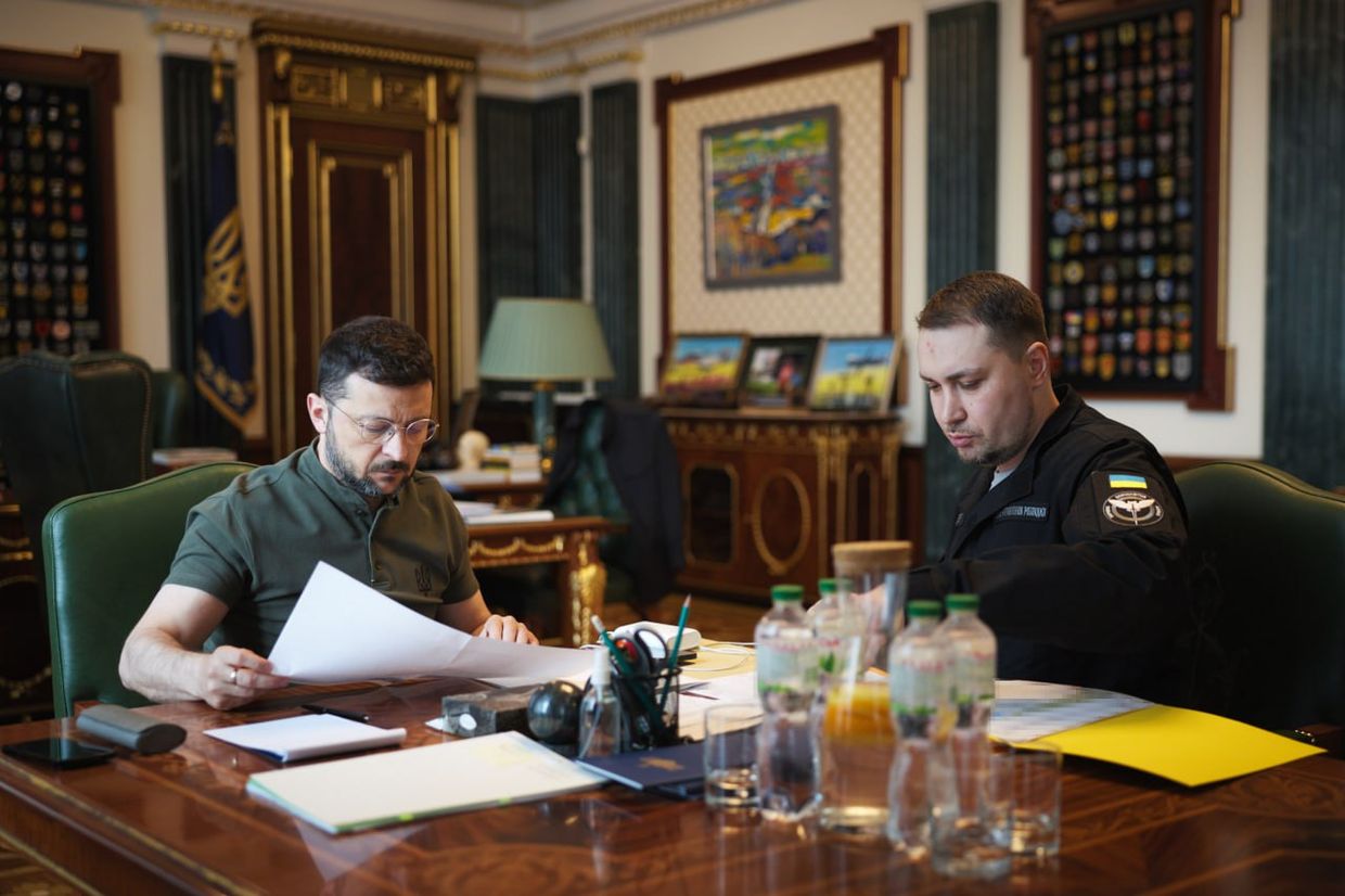 A few men looking at papers

AI-generated content may be incorrect.