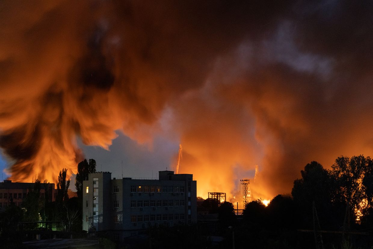 A fire in the city at night
AI-generated content may be incorrect.