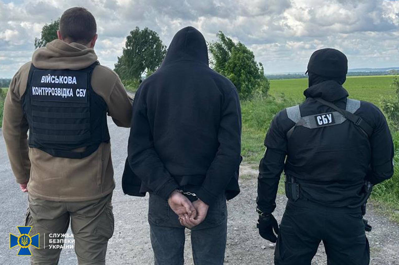 A group of men in black jackets
AI-generated content may be incorrect.