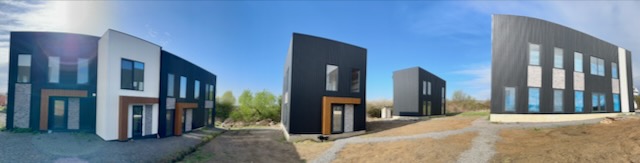 A building with a door and a driveway

AI-generated content may be incorrect.