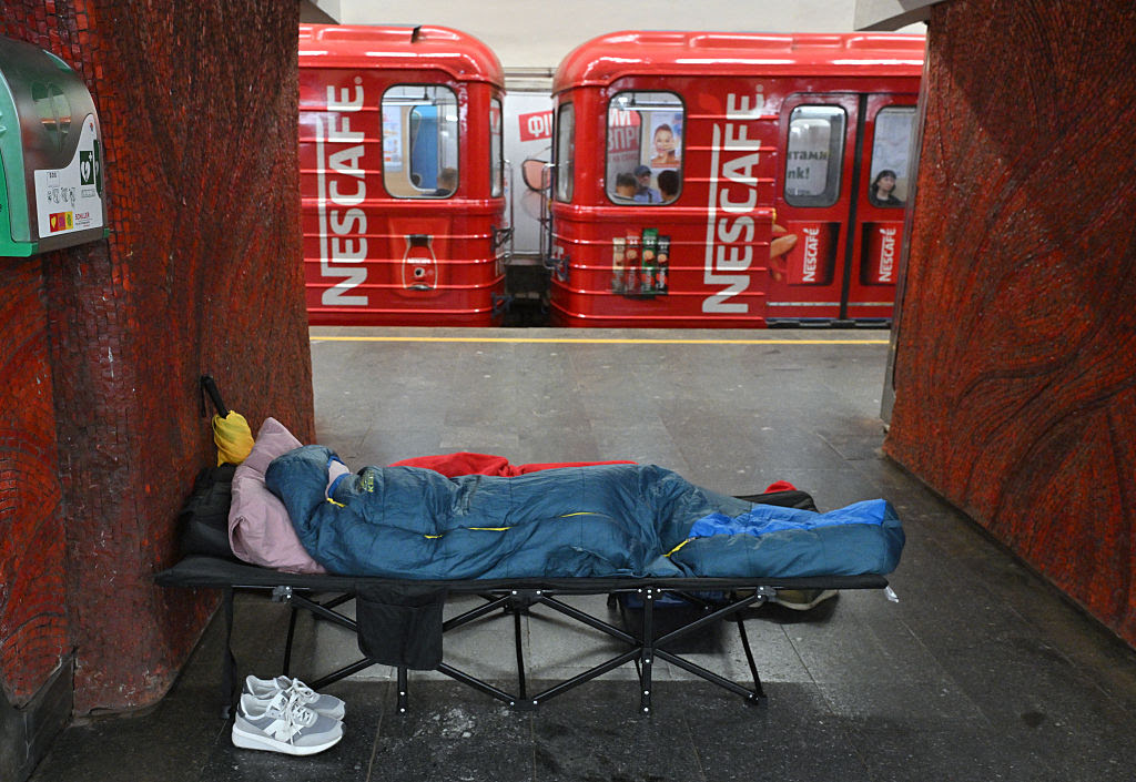 A person sleeping on a bed

AI-generated content may be incorrect.