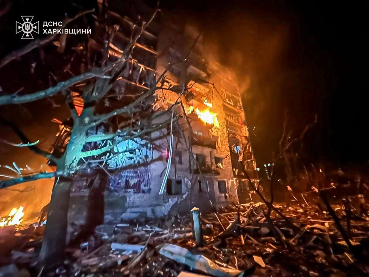 A building on fire at night

AI-generated content may be incorrect.