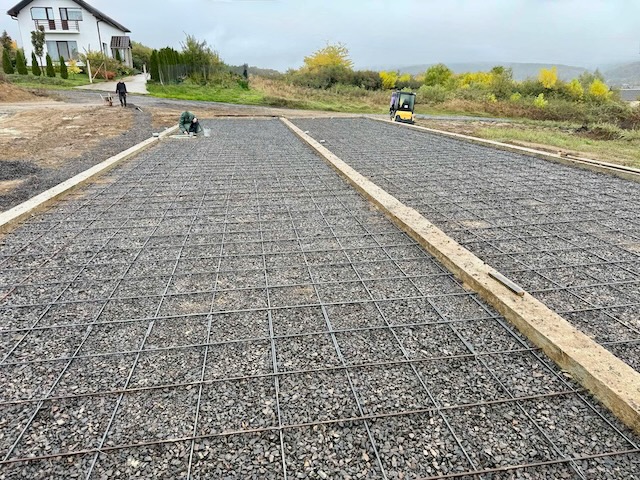 A road with gravel and metal bars AI-generated content may be incorrect.