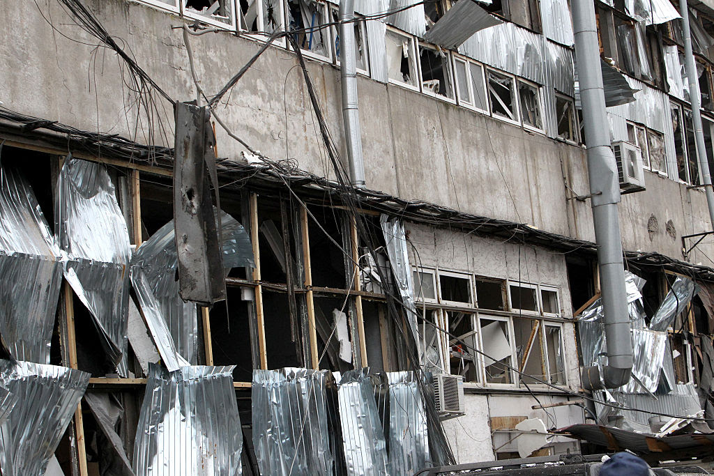 A building with broken windows

AI-generated content may be incorrect.