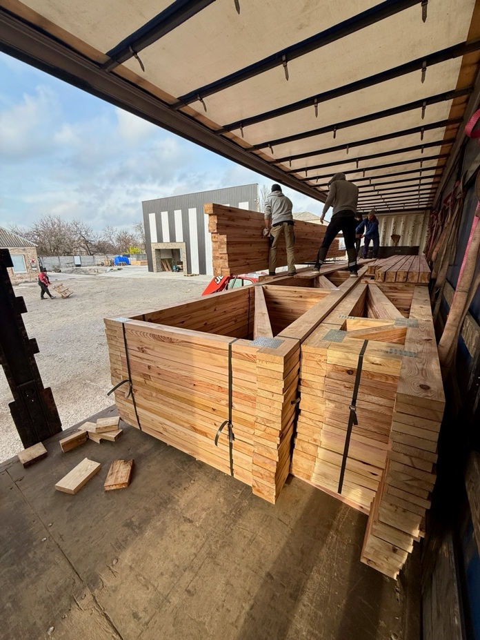 A group of men working on a building AI-generated content may be incorrect.