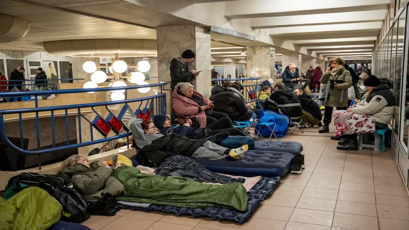 People take shelter at a metro station during Russian drone and missile attacks in Kyiv, Ukraine, on Jan. 9, 2026