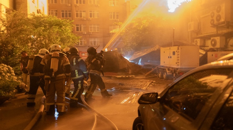 Ukrainian firefighters battle a fire in a building previously hit during a Russian air attack on Kyiv, Ukraine, early on July 2, 2026.